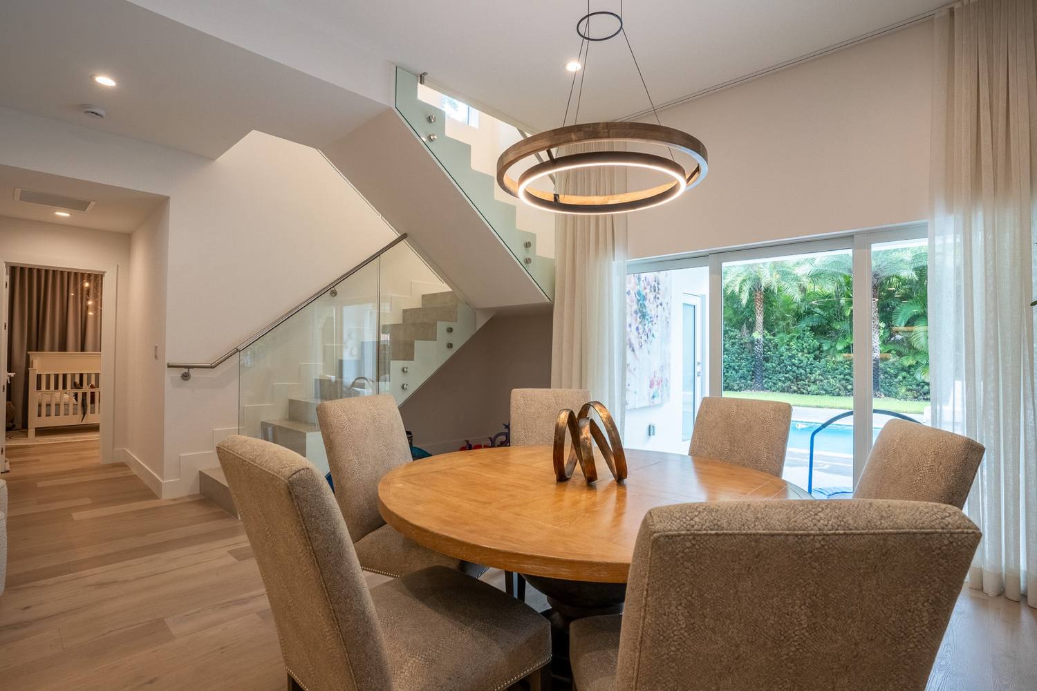 Dining table beneath the custom stair, second angle